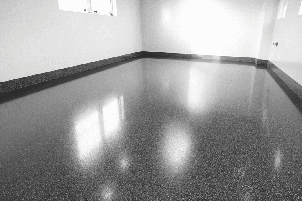 An overview of epoxy flooring showing a smooth, shiny garage floor.