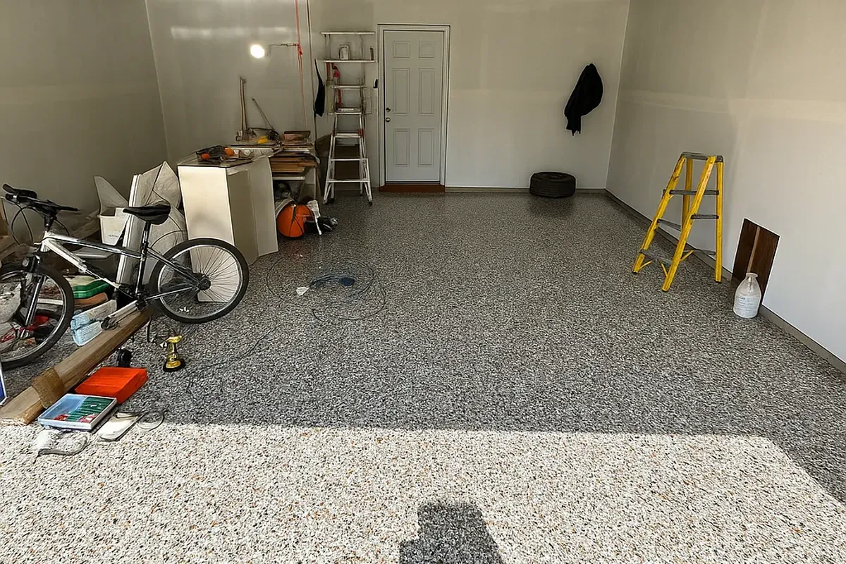 Digital preview of a Schist flake blend rendered onto a photo of the Palatine homeowner's own garage floor