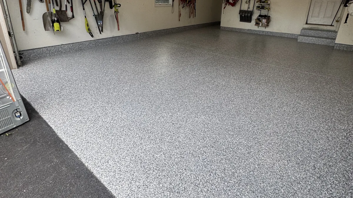 Finished 2-car polyurea flake garage floor coating in Antioch, IL