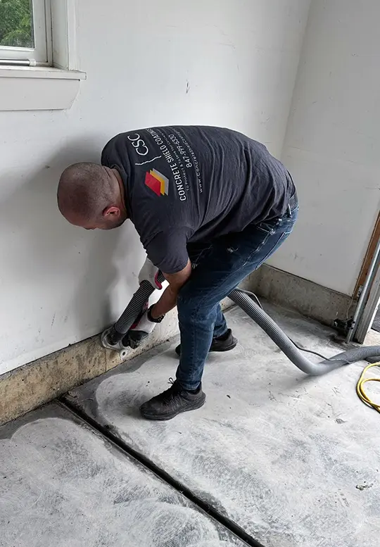 Concrete grinding and preparation for a garage floor coating in Chicago