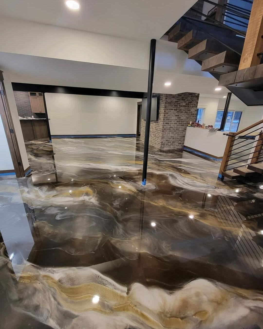 Metallic epoxy floor with dramatic marbling