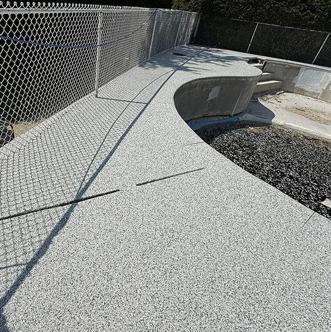 Pool deck with slip-resistant flake coating near Niles, IL