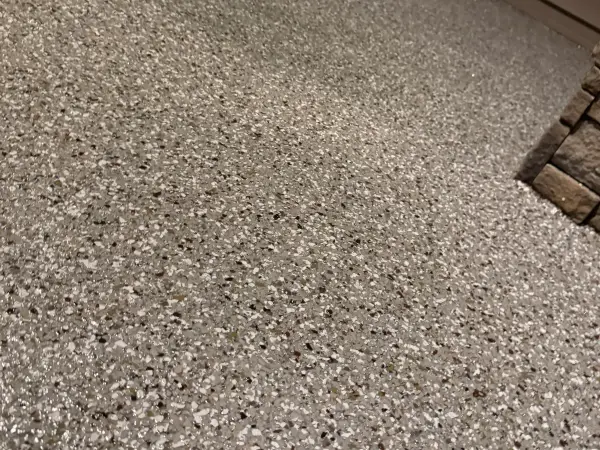 Close-up of Creekbed flake texture on finished porch floor in Naperville