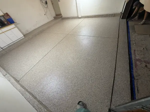 Completed Buffalo Grove garage floor with Creekbed polyurea flake coating