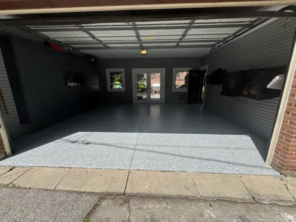 Finished garage floor with gray polyurea flake coating in Chicago