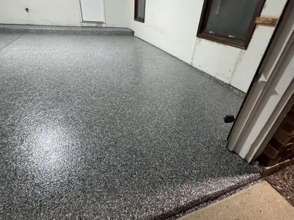 Glossy gray flake polyurea garage floor finished in Hawthorn Woods, IL