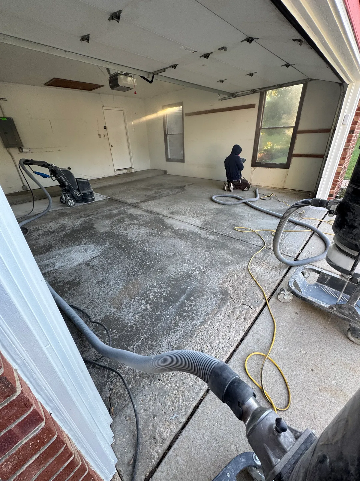 Before: Polyurea flake 4-car garage floor in Hawthorn Woods, IL